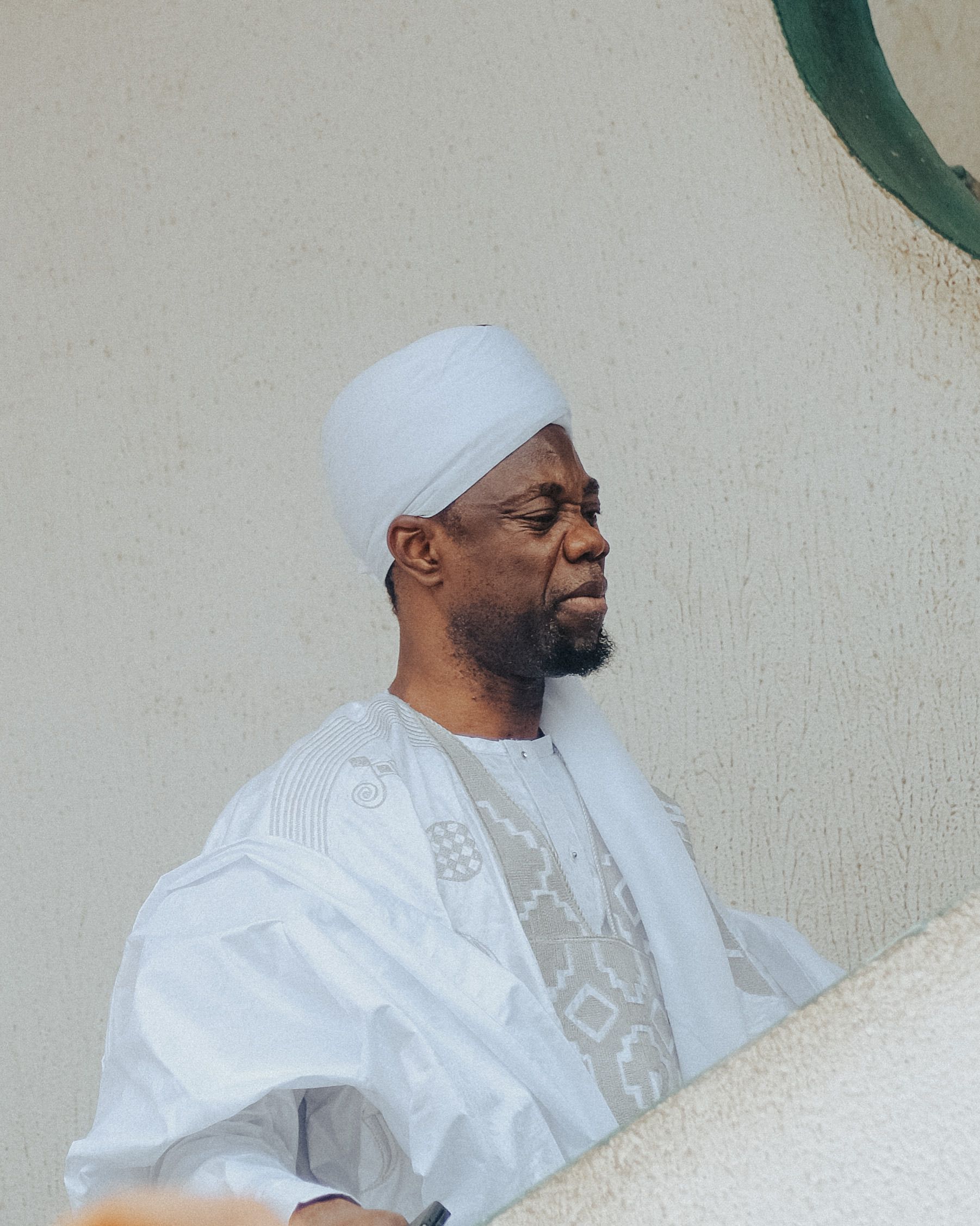 Portrait of a Bearded Man Wearing a White Robe and a Kufi · Free Stock ...