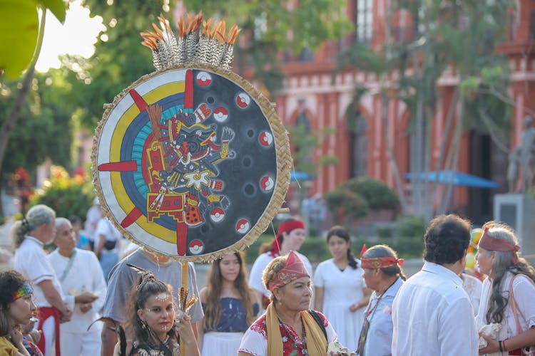 People Celebrating A Mexican Holiday On The Street