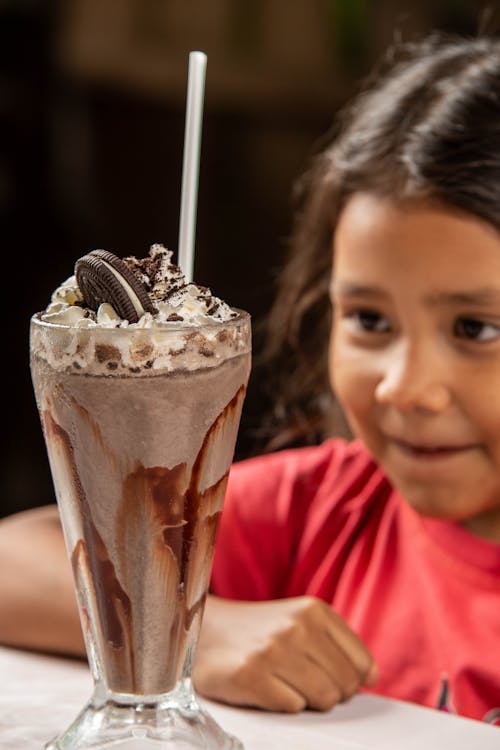 Child with a Chocolate Dessert