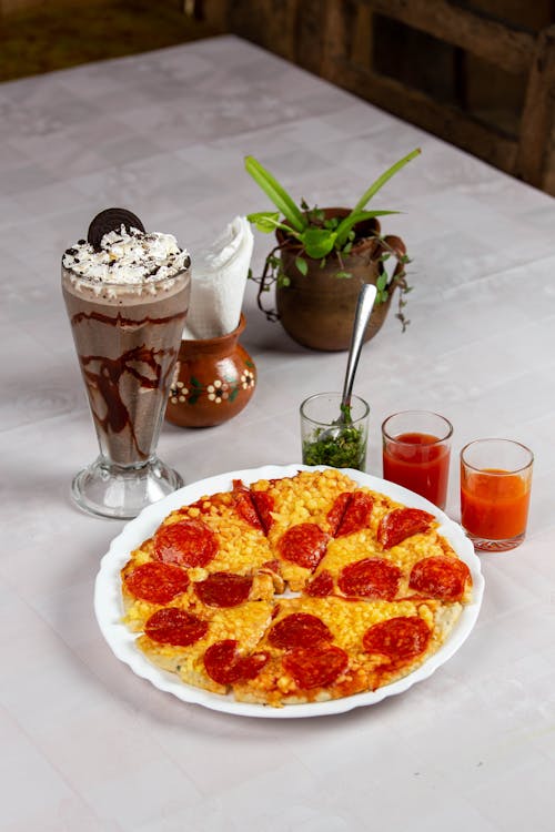 Pepperoni Pizza and a Dessert in a Glass