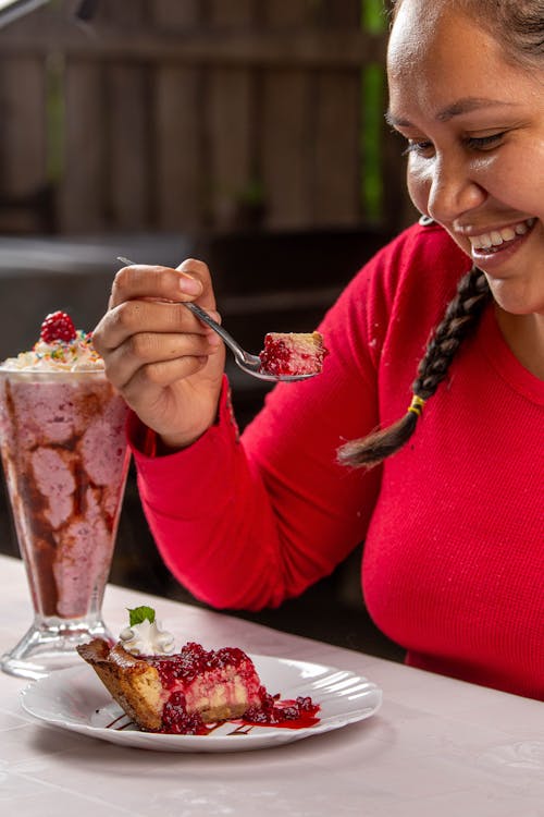 Woman Enjoying Dessert