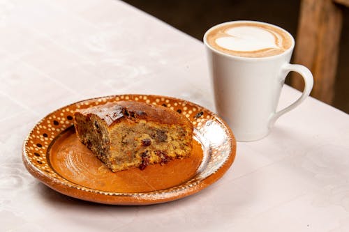 Bread Served with Coffee in a Restaurant