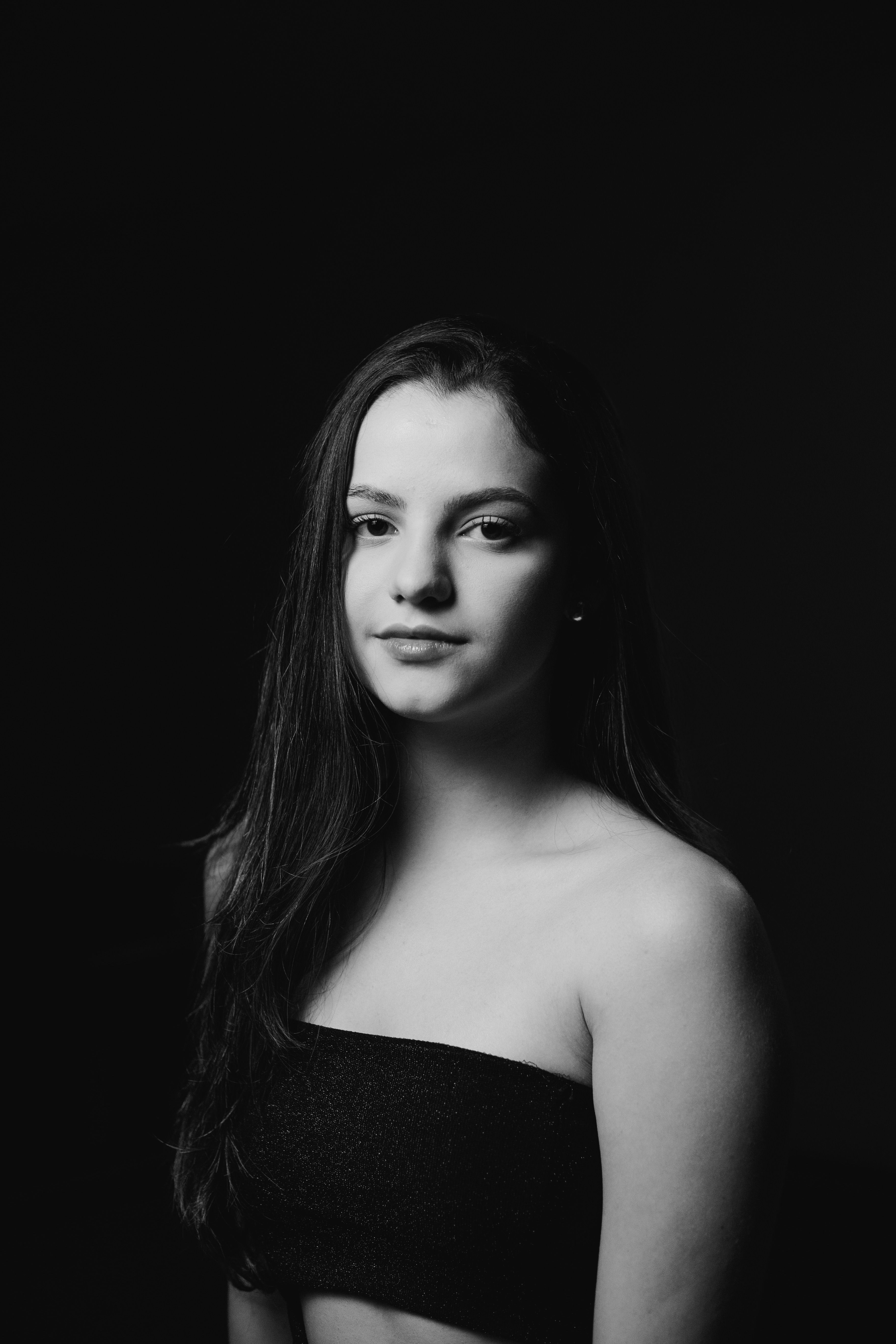 Young Woman in Pink Dress Posing in Studio · Free Stock Photo
