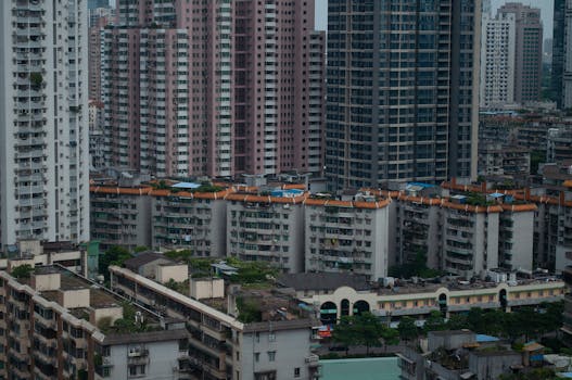Aerial view of modern high-rise buildings in downtown Guangzhou, showcasing urban residential districts.