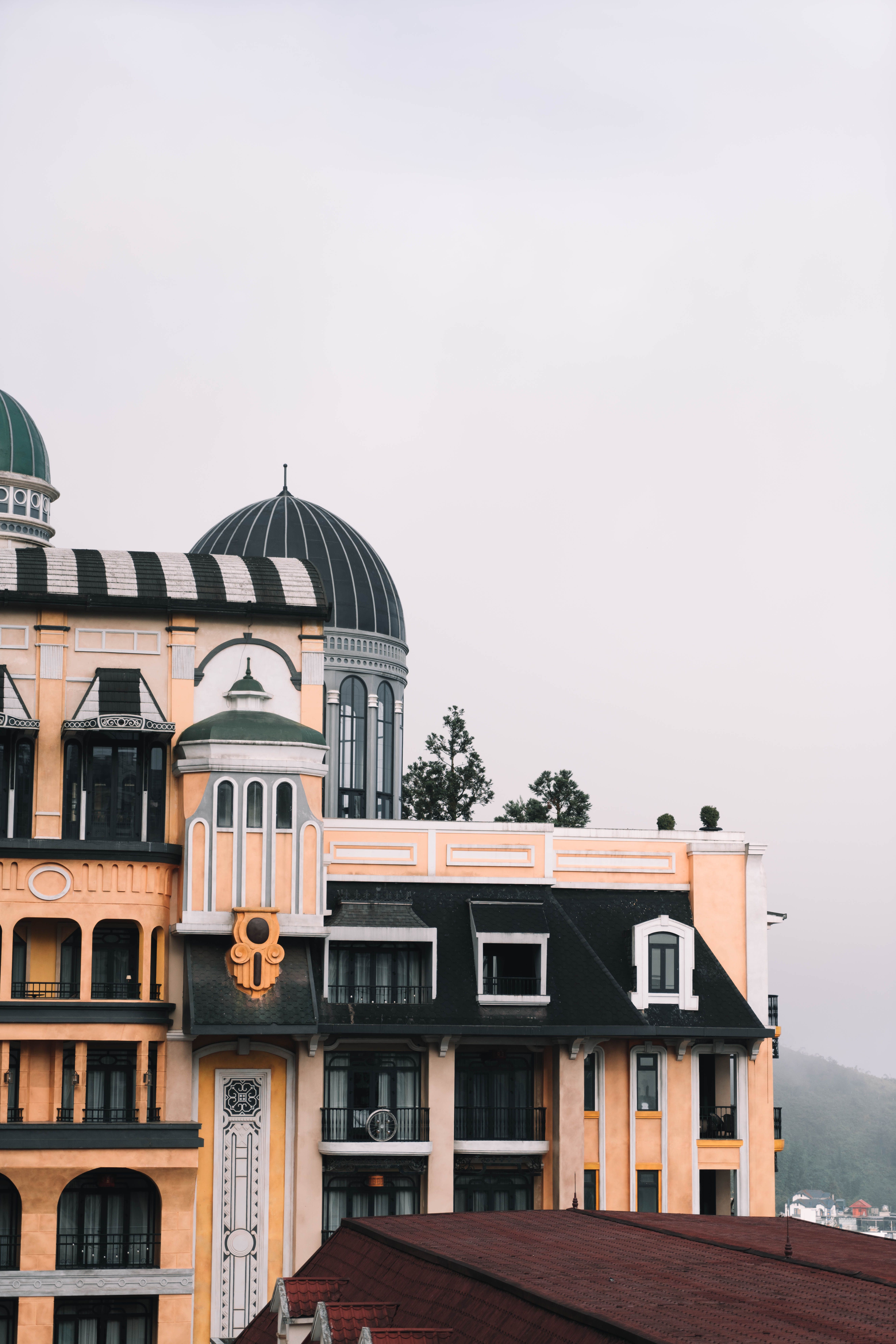 Classic Building Facade against Sky · Free Stock Photo