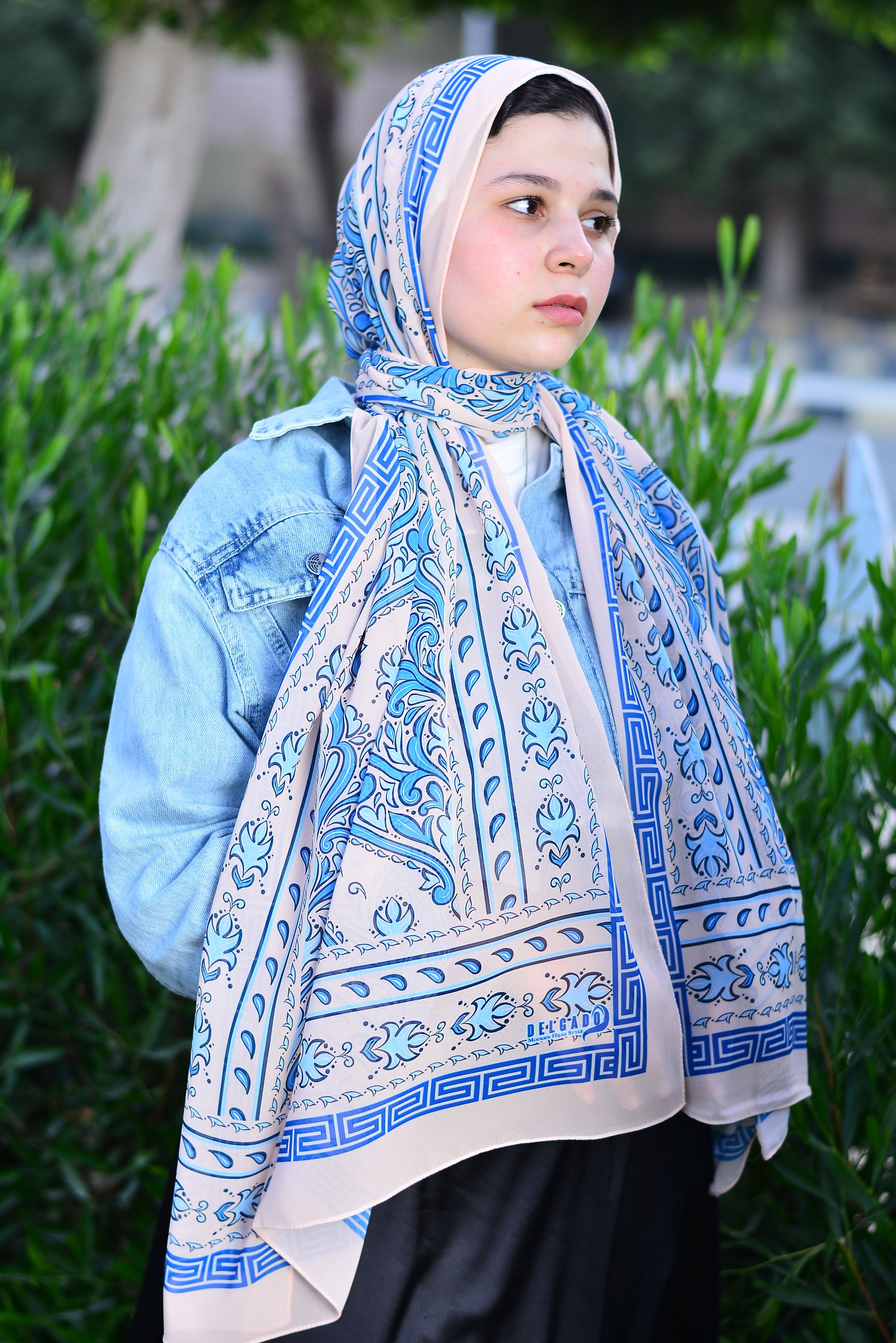 Portrait of a Woman Wearing Colorful Headscarf · Free Stock Photo