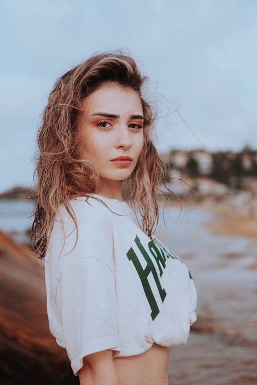 Blonde Woman Posing in White Clothes