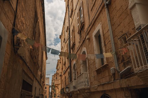 View of a Narrow Alley between Residential Buildings in Valletta, Malta