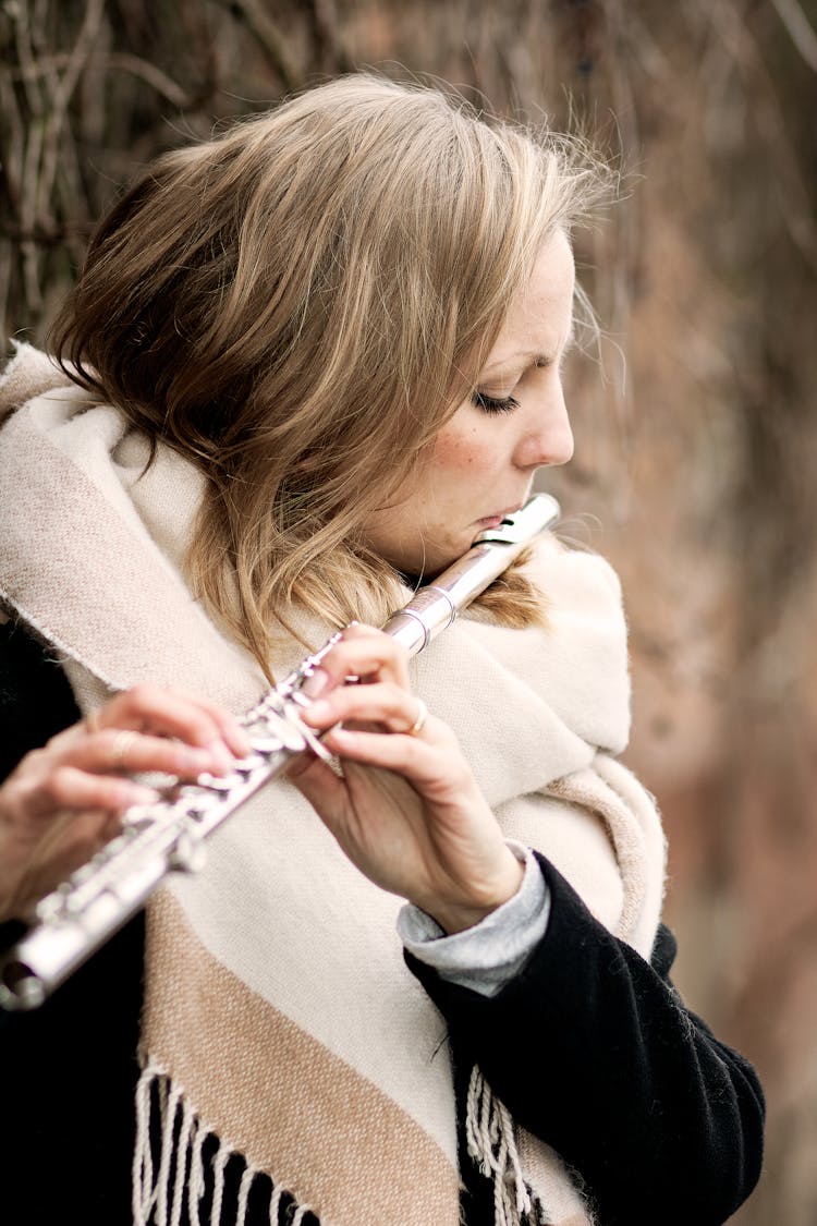 Woman Playing Flute