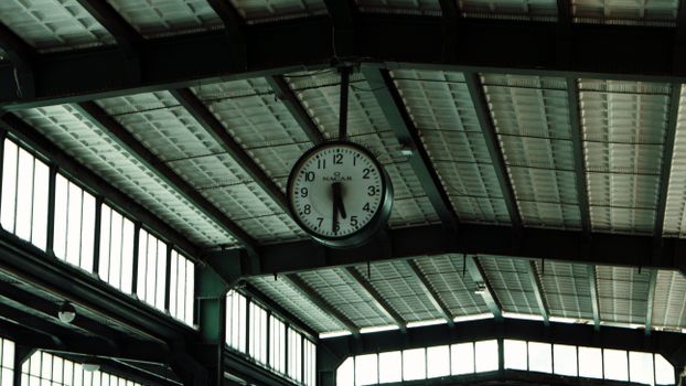 Clock Hanging under Ceiling