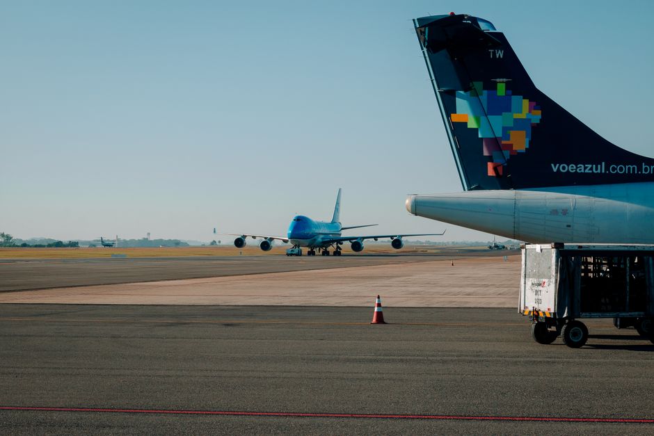 Airplane on a tarmac at a Portuguese airport with a sunny sky