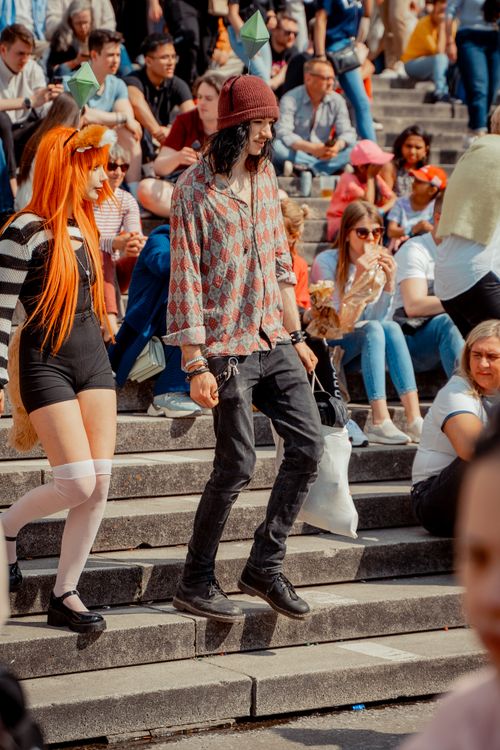 Free Cosplay participants at a lively outdoor event in Düsseldorf, Germany, enjoying a sunny day. Stock Photo