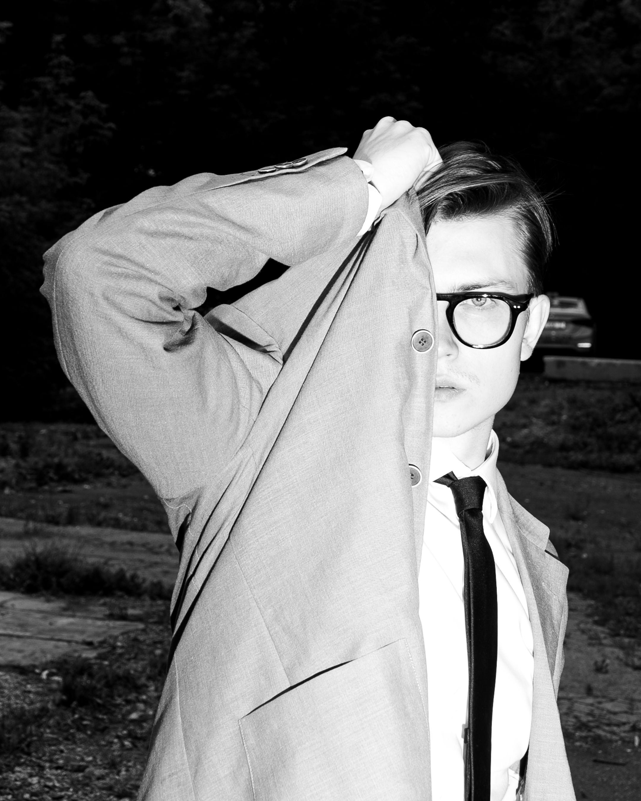 Young Man Covering his Face with his Suit · Free Stock Photo