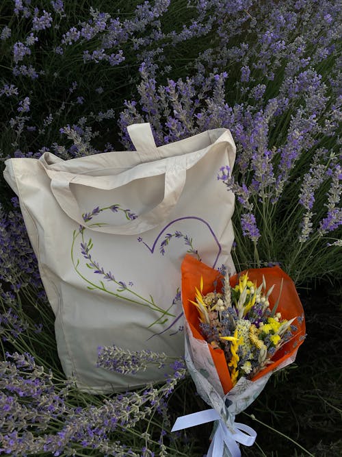 A Bag and a Bouquet on the Ground