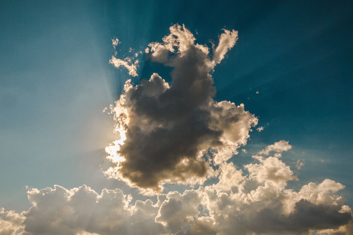 Dramatic clouds with sun rays piercing through representing the shift most affiliate marketers have overlooked in telehealth
