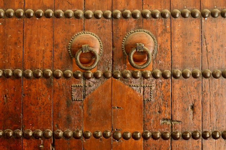 Brass Handles On Wooden Door