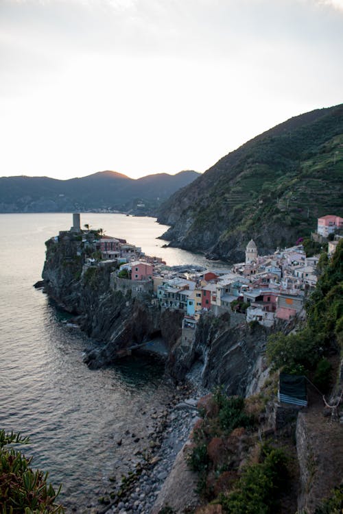 Vernazza Town on Hills and Rocks on Sea Shore