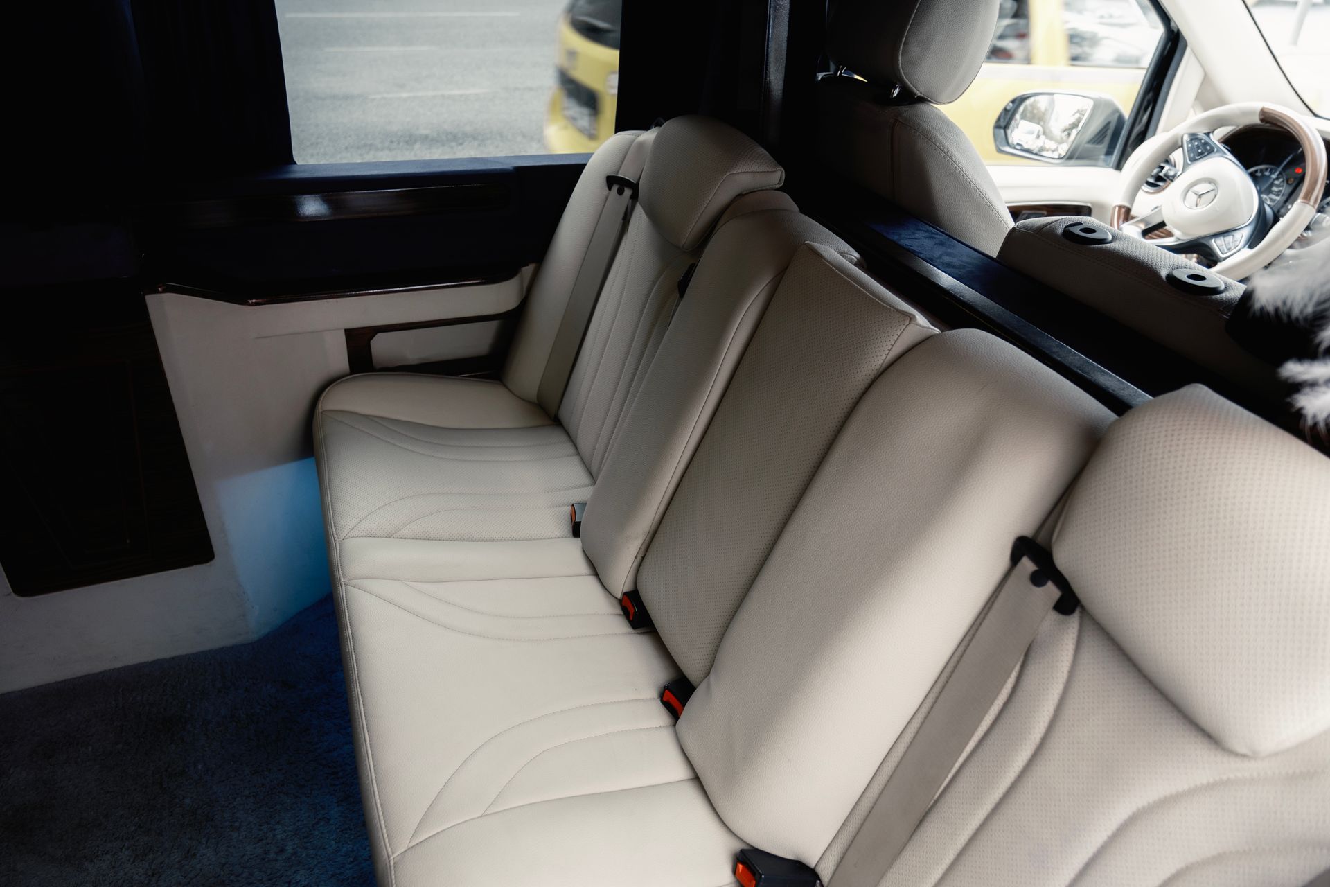 Luxury leather seating inside a modern passenger van — comfortable private transfer