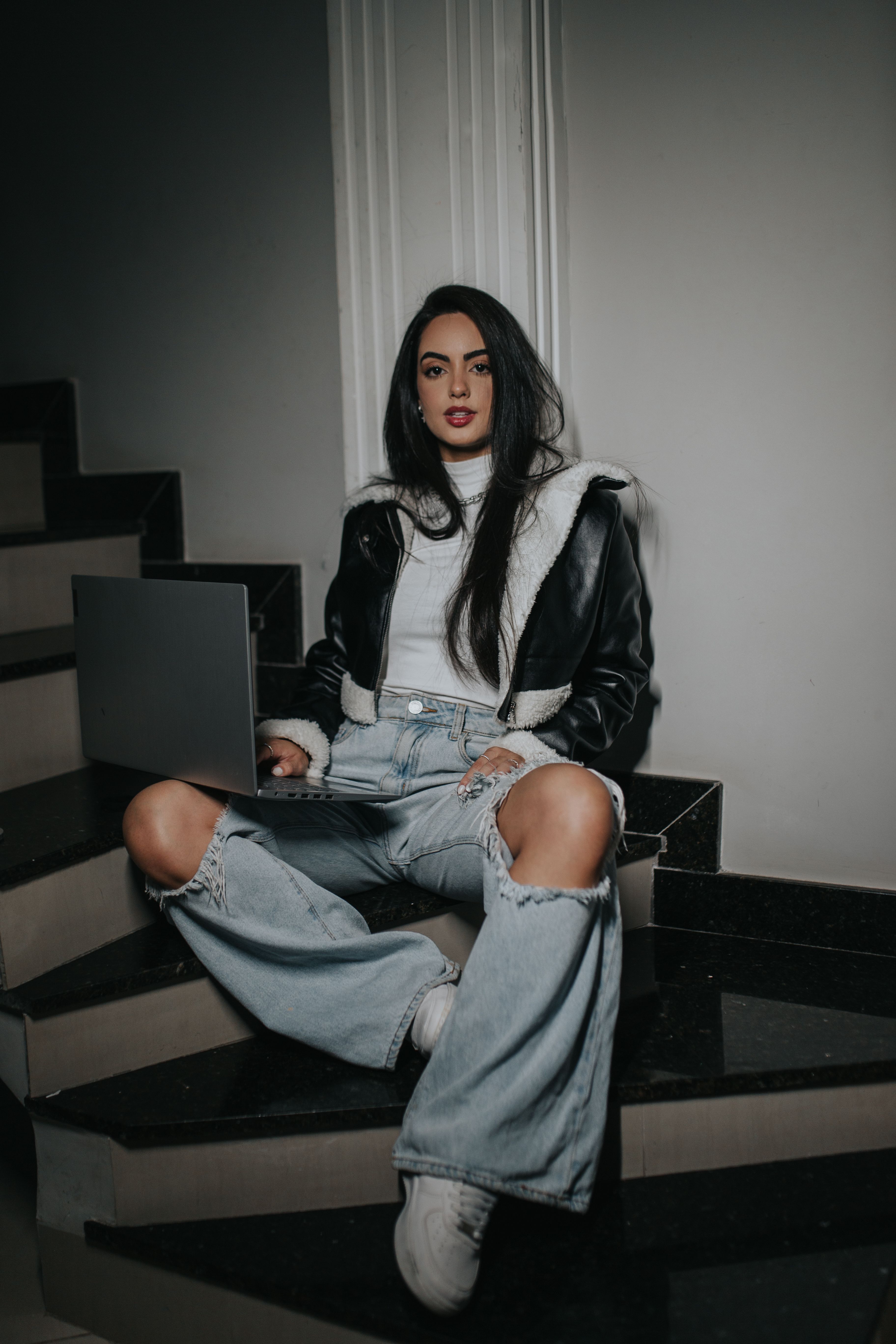 Brunette in Ripped Jeans and Jacket · Free Stock Photo