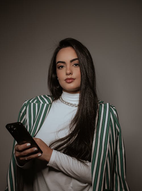 Brunette in Striped Jacket