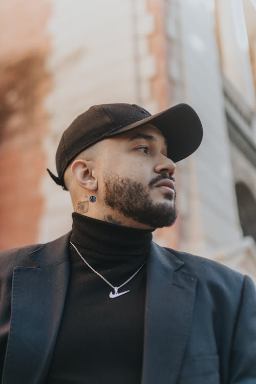 Bearded Model in Turtleneck Sweater and Cap