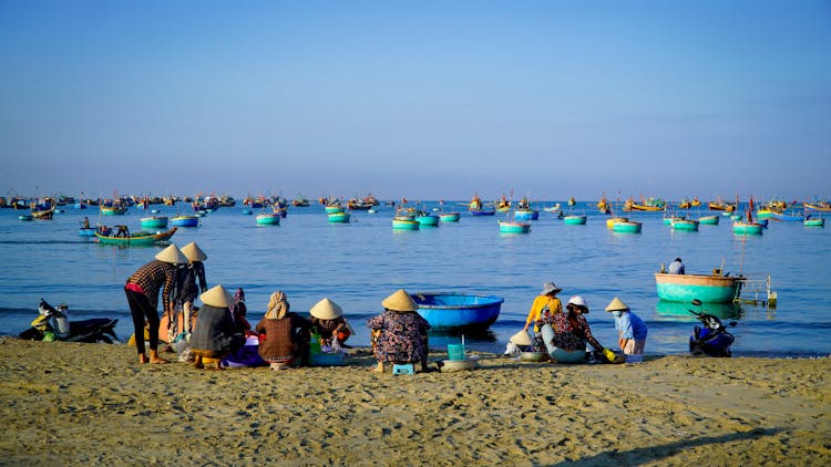 Women Working At Beach