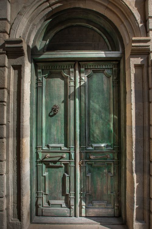 Free Elegant vintage green door with ornate design in Baku, Azerbaijan. Stock Photo