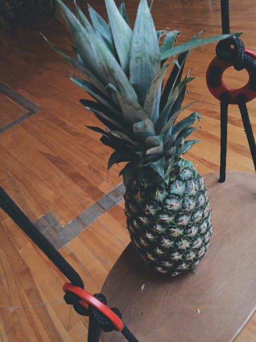 Free stock photo of fruit, hardwood floor, pineapple