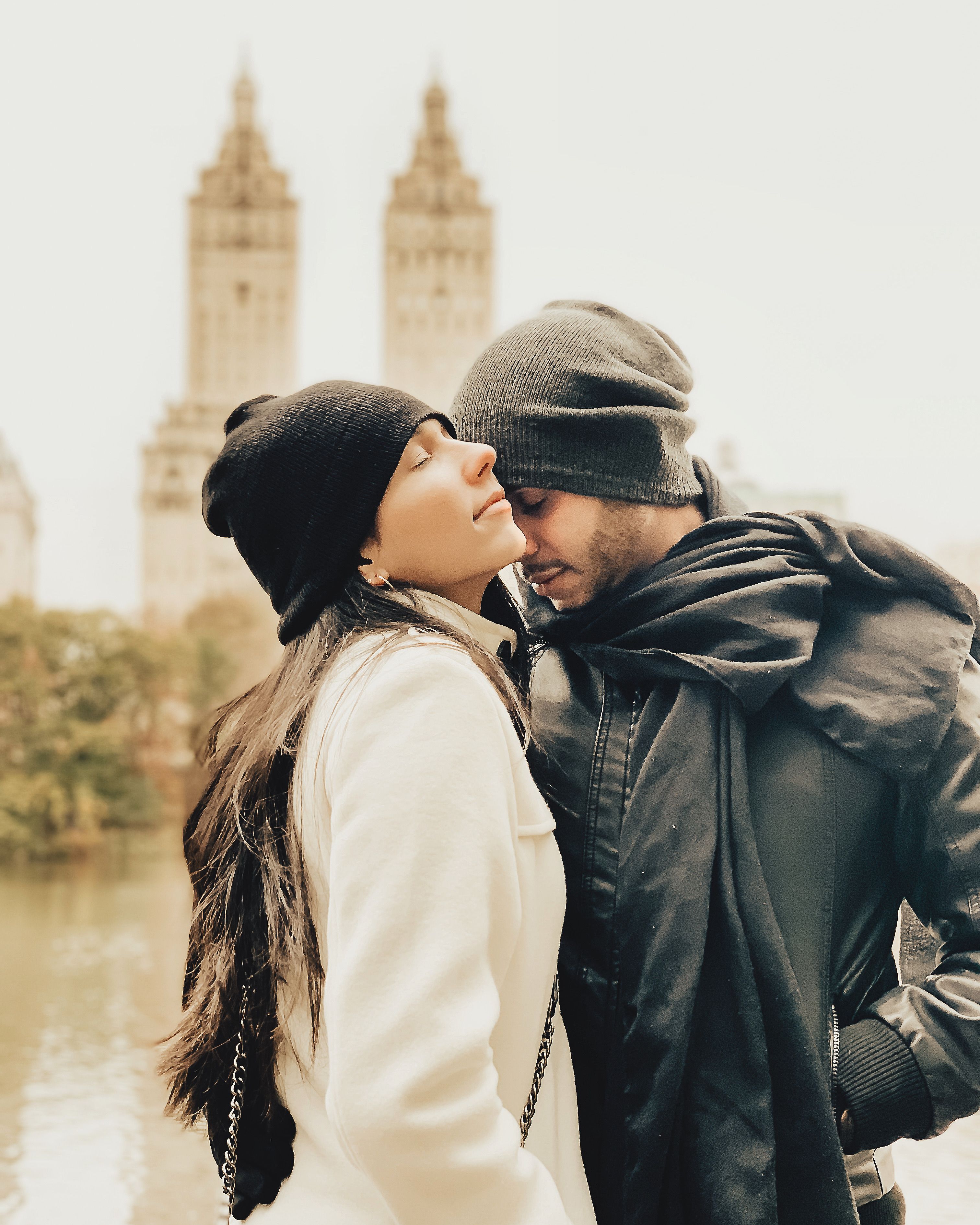 Romantic winter embrace of a couple in Central Park, New York City.