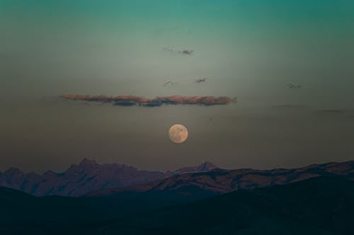 Full Moon over Mountain Landscape