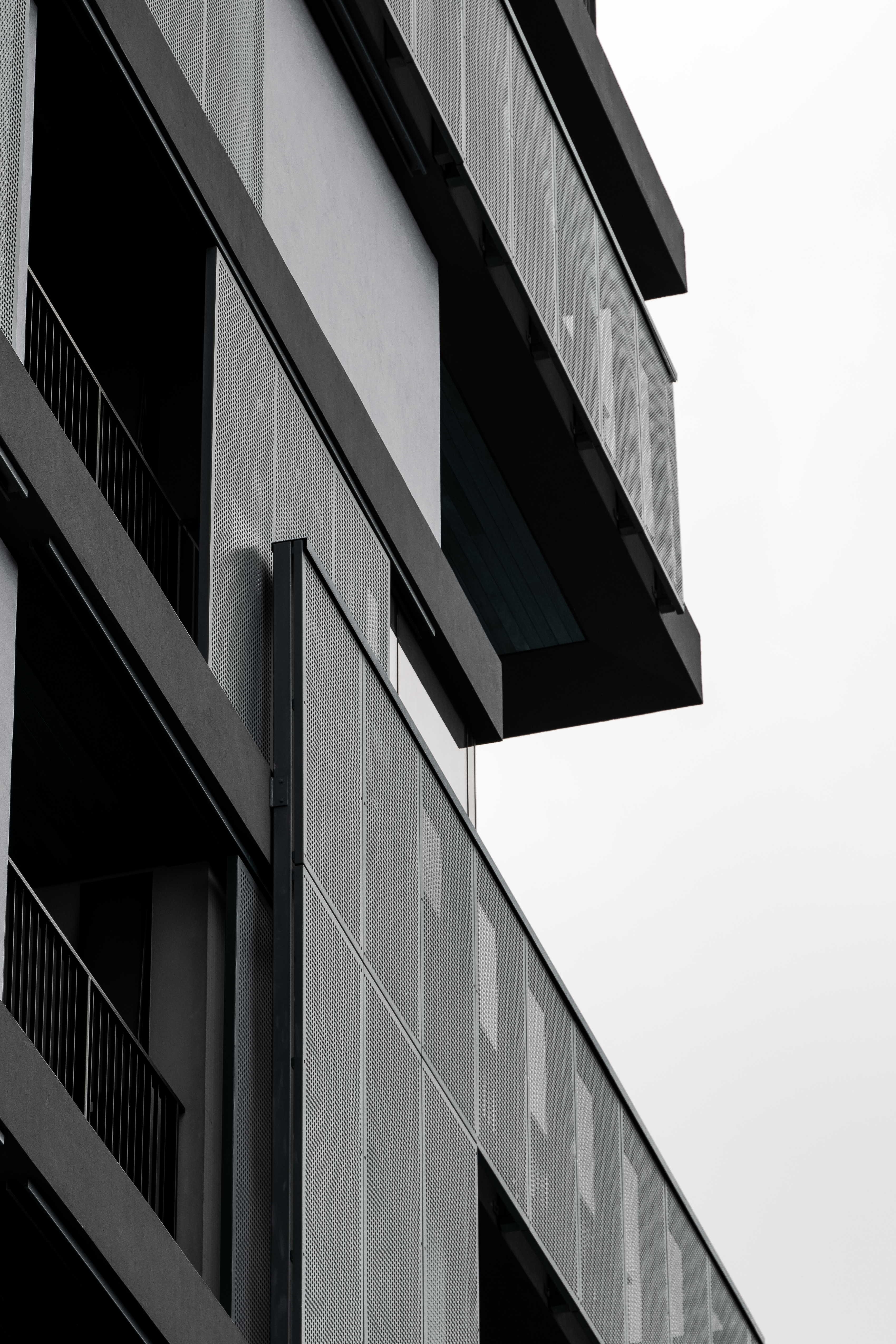 Close-up of a modern office building facade in Curitiba, PR, Brazil, highlighting sleek design.