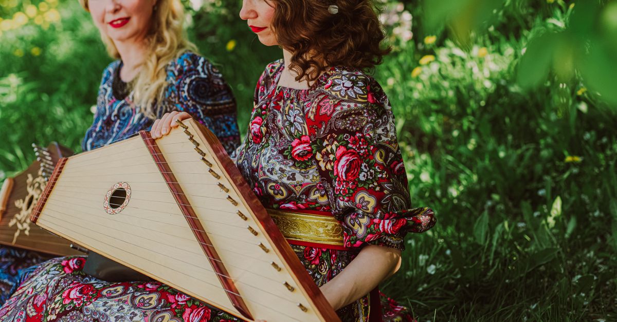 Women's Riding Instrument Women with Traditional Music Instrument · Free Stock Photo