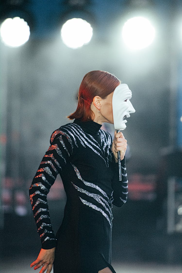 Woman With Mask On Stage