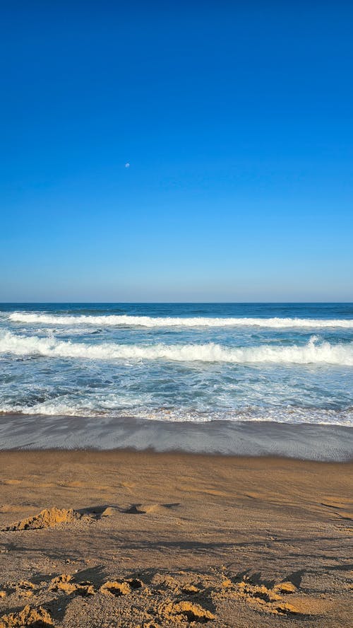 Foto profissional grátis de areia, costa, horizonte