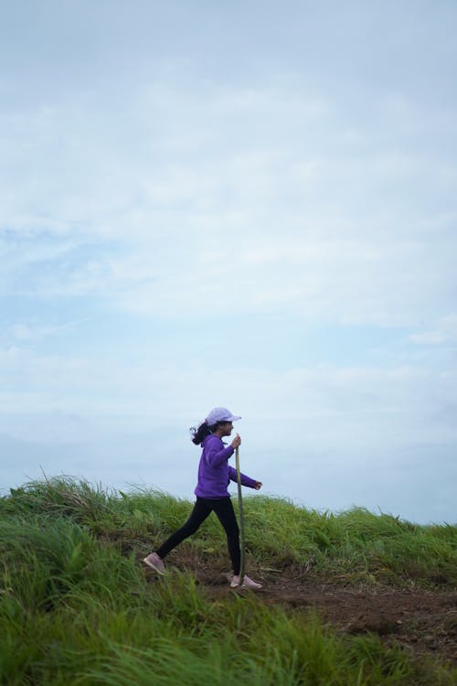 A Girl Hiking in Mountains 