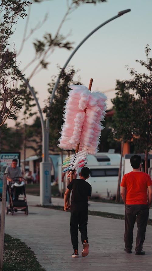 Foto stok gratis berjalan, kota, permen kapas