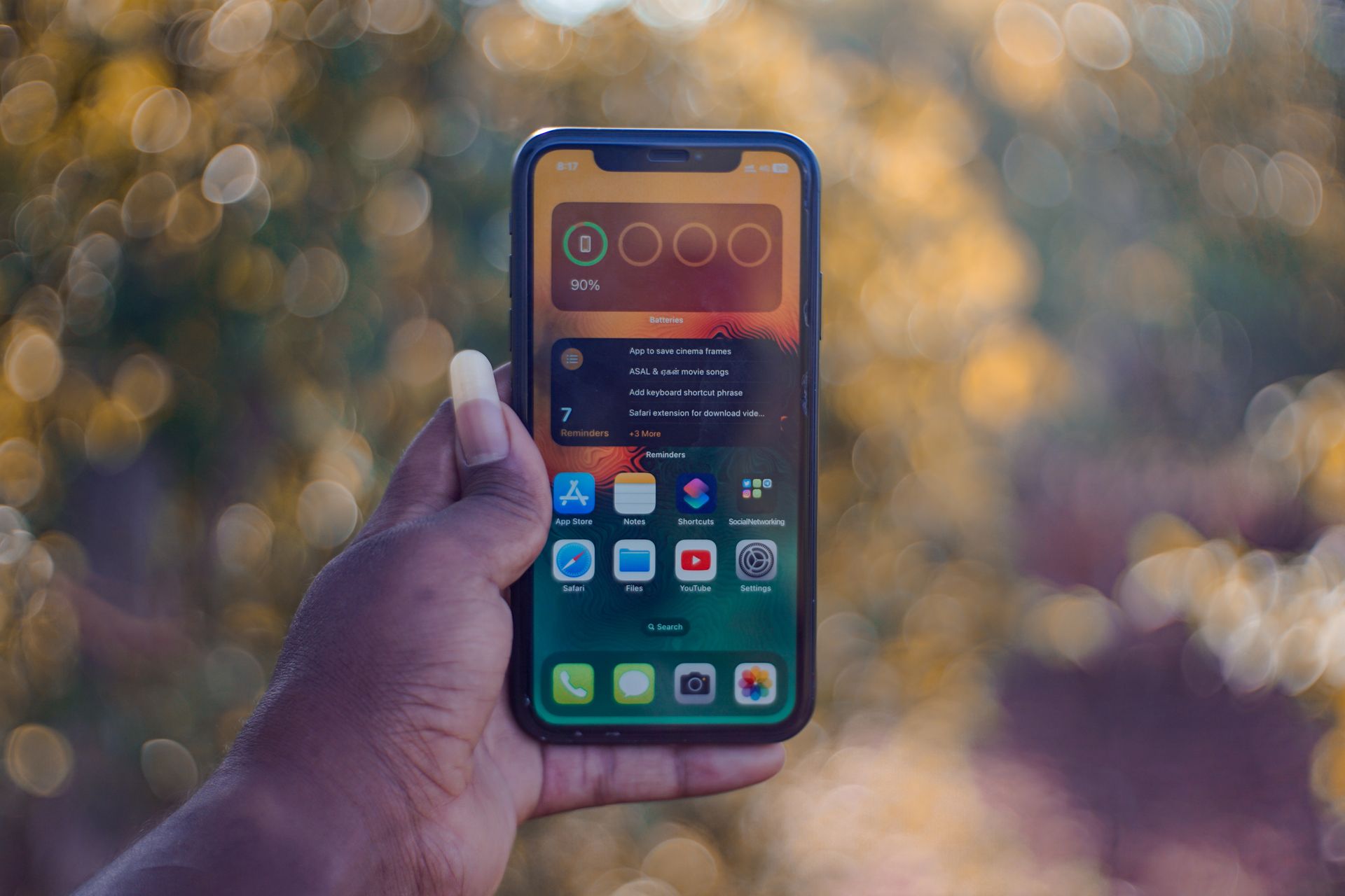 A smartphone screen showing blurred app icons
