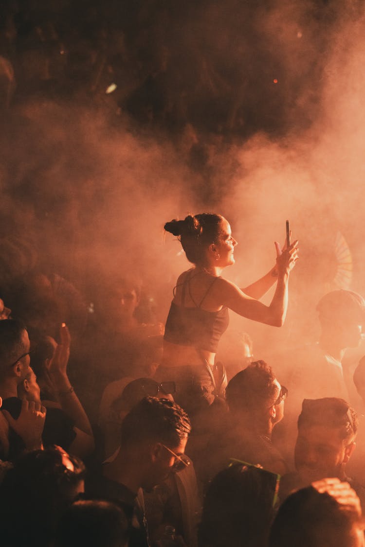 Woman Over Crowd On Concert