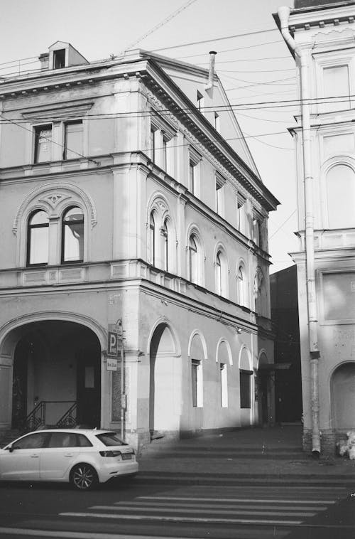 Building by Street in Black and White