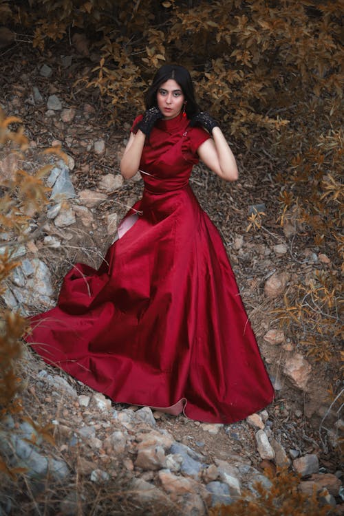 Brunette Woman in Red Dress and Gloves