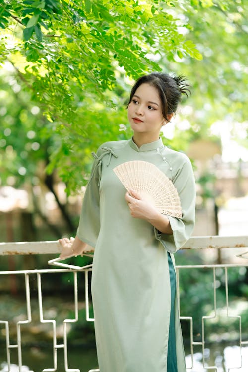 Model in Dress with Fan