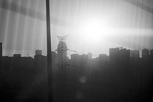 Black and White Picture of a Silhouetted Urban Skyline 