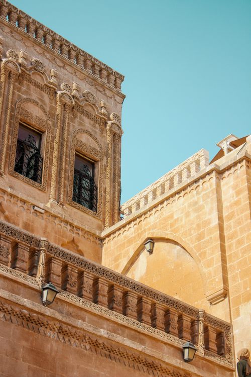 Free Detailed view of traditional architecture in Midyat, Turkey. Clear blue sky background. Stock Photo