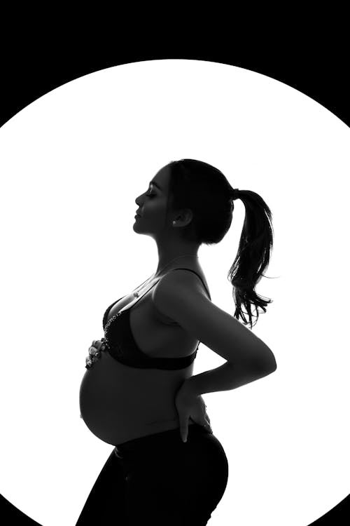 Black and White Studio Shot of a Pregnant Woman 
