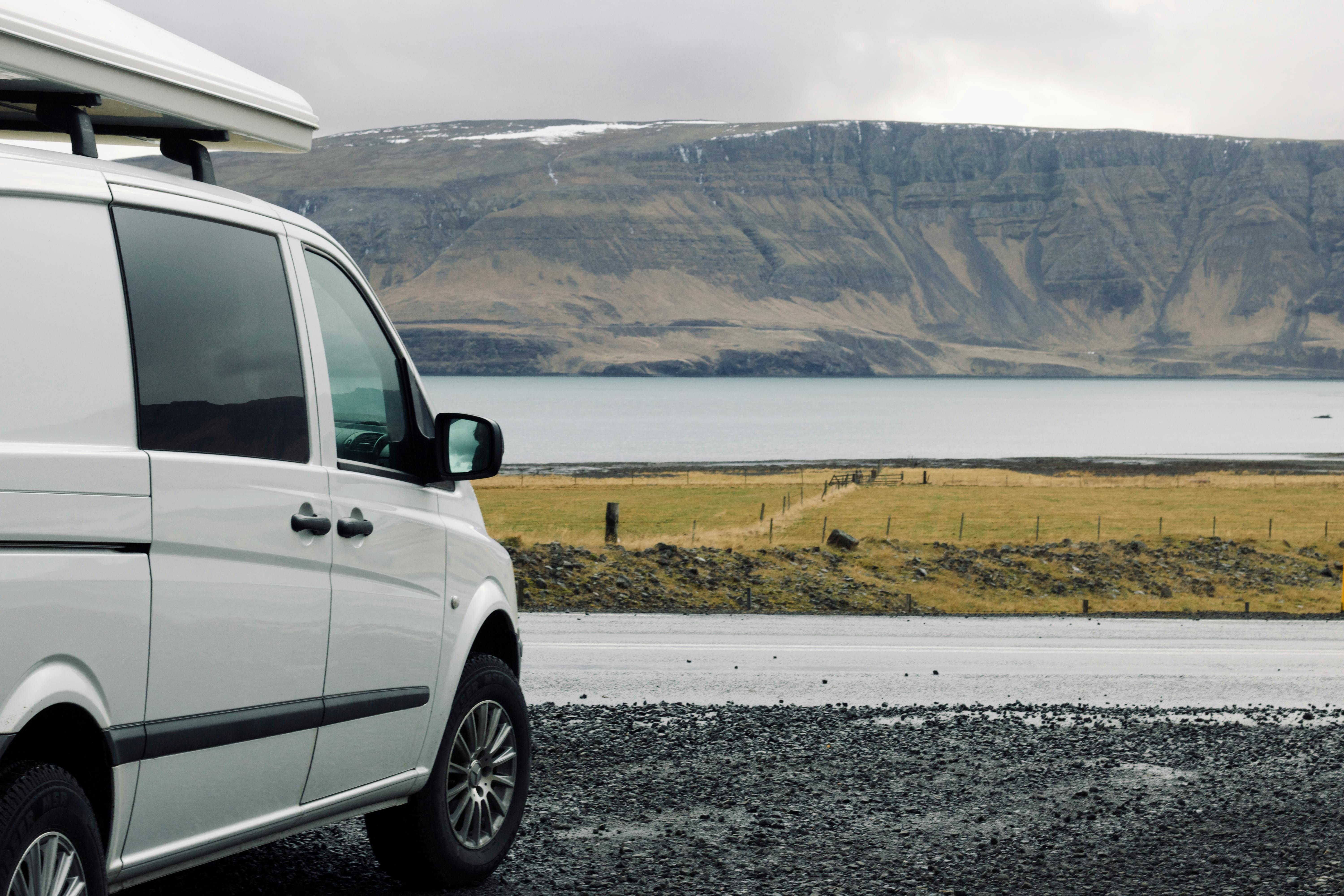 campervan in front of a lake