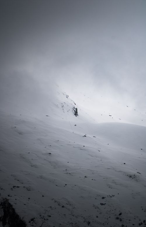 Free A serene winter scene showcasing a snowy mountain landscape in Hintertux, Austria. Stock Photo