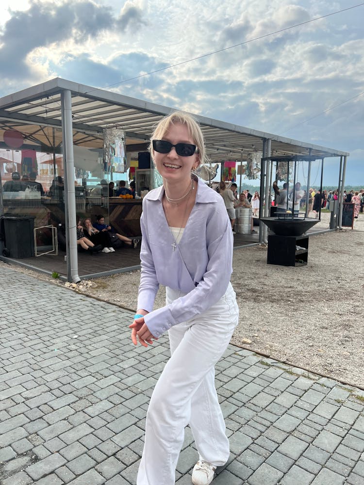 Smiling Woman Against Beach Bar