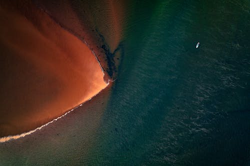 Canoe on Sea Shore with Beach