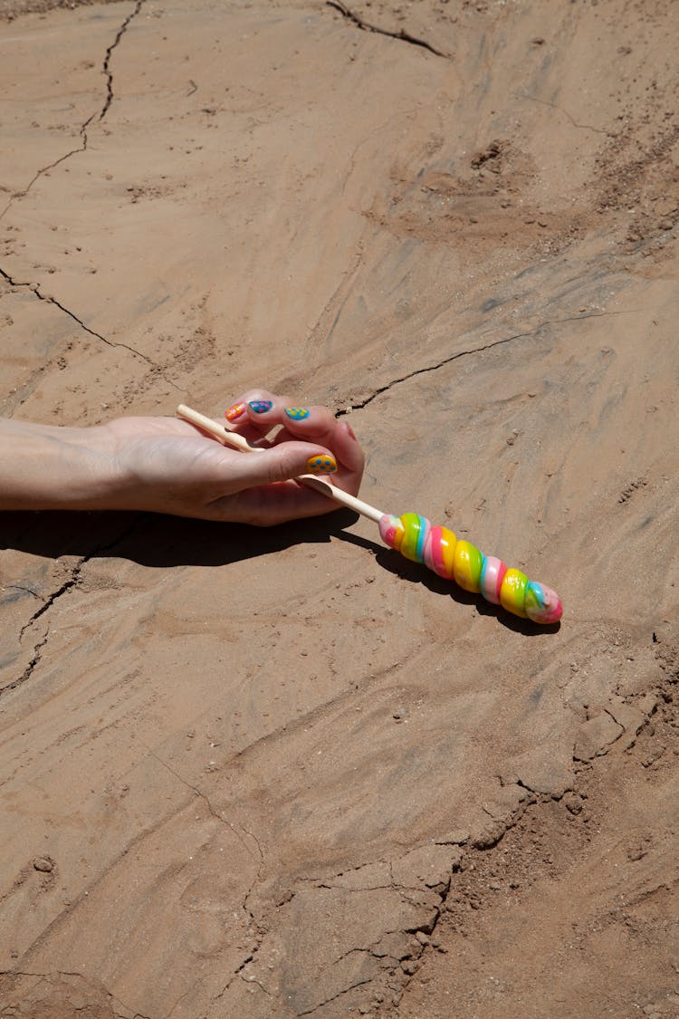 Lollipop In Woman Hand