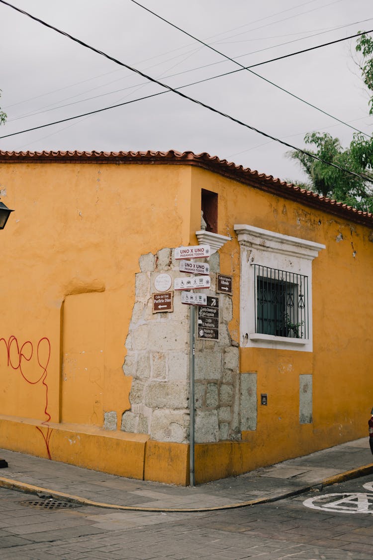 Yellow House On Street Corner